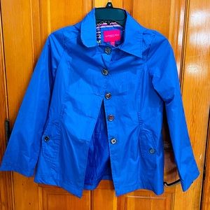 Periwinkle raincoat, all buttons there.